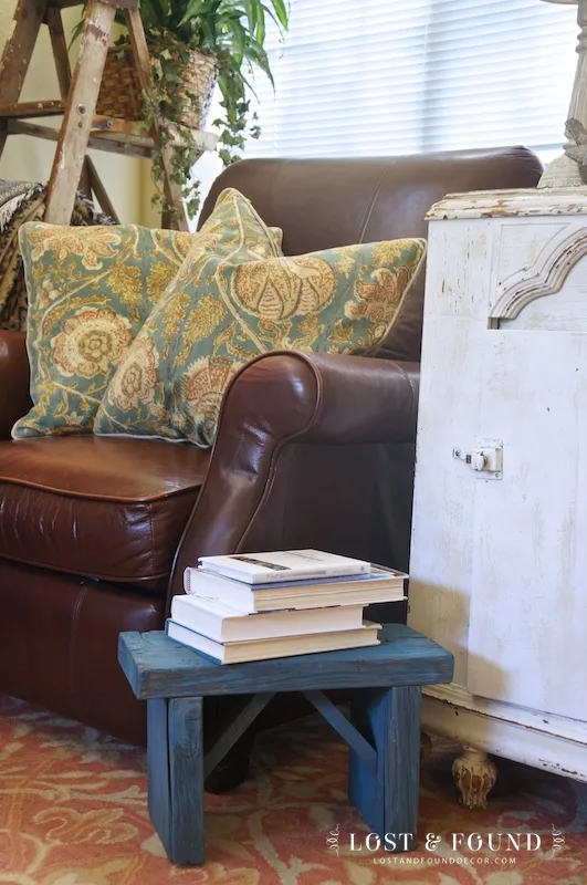 Use A Small Footstool as an added side table
