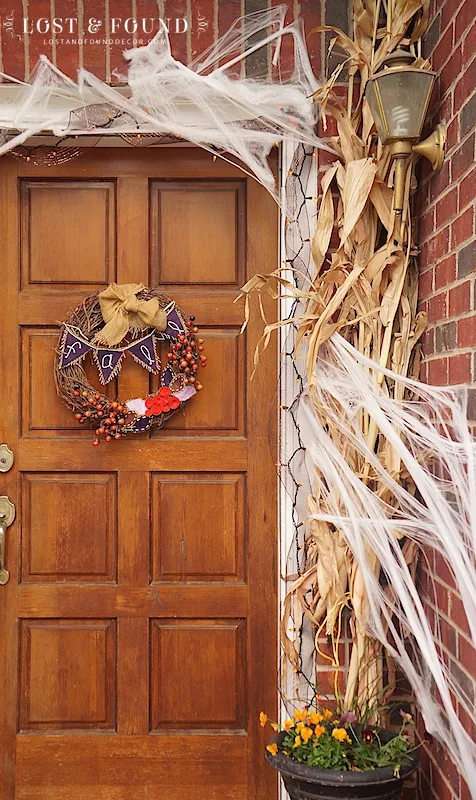 Front door Halloween decorations with corn husks