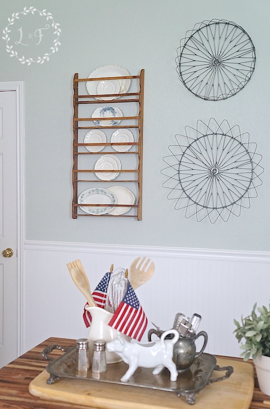 Kitchen Decor, using old parts of metal, folding laundry basket as wall art