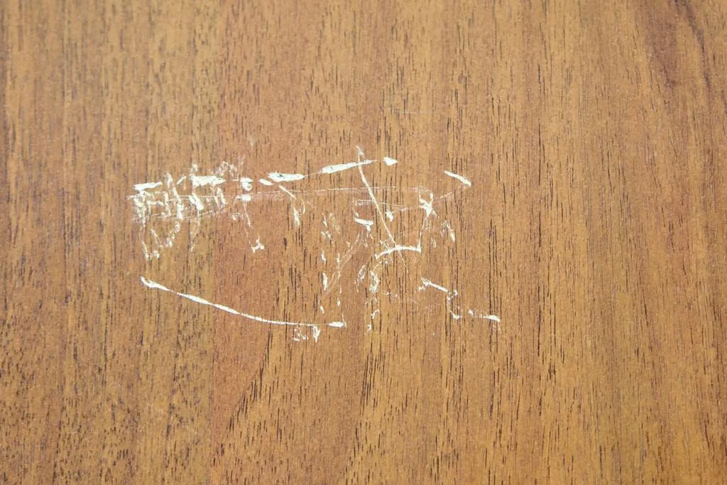 Deep scratches in wood furniture that go below the topcoat