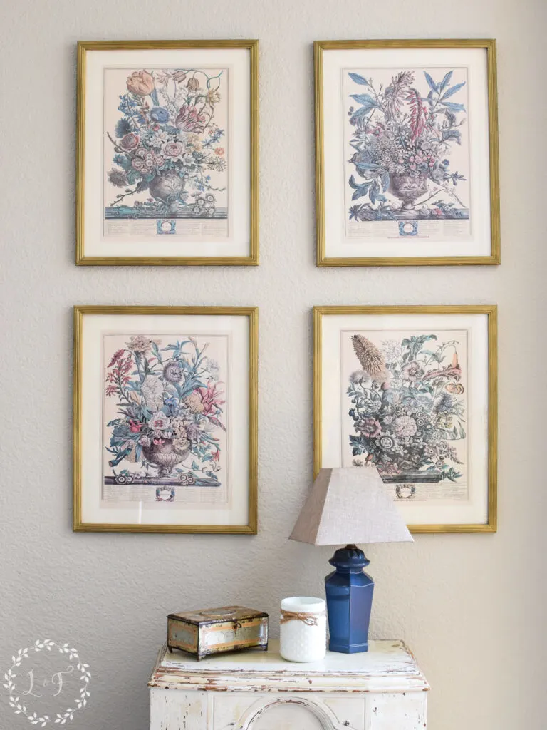 floral prints hanging on a wall