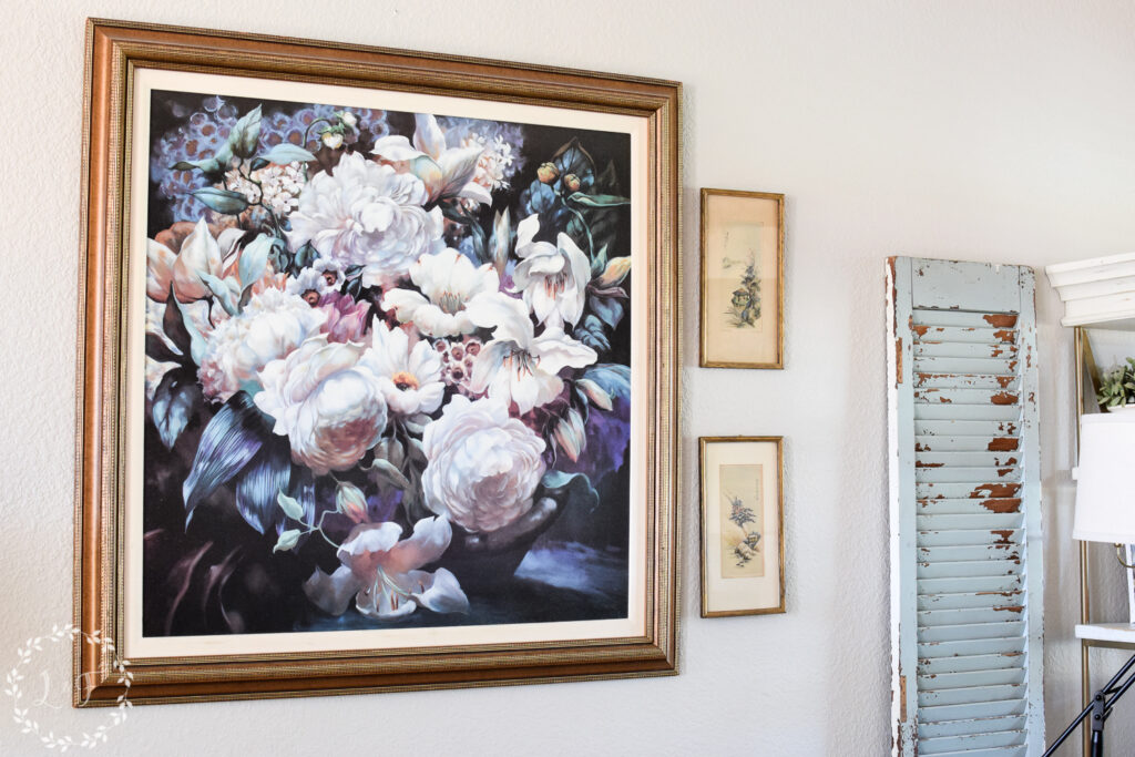 large floral artwork hanging in living room