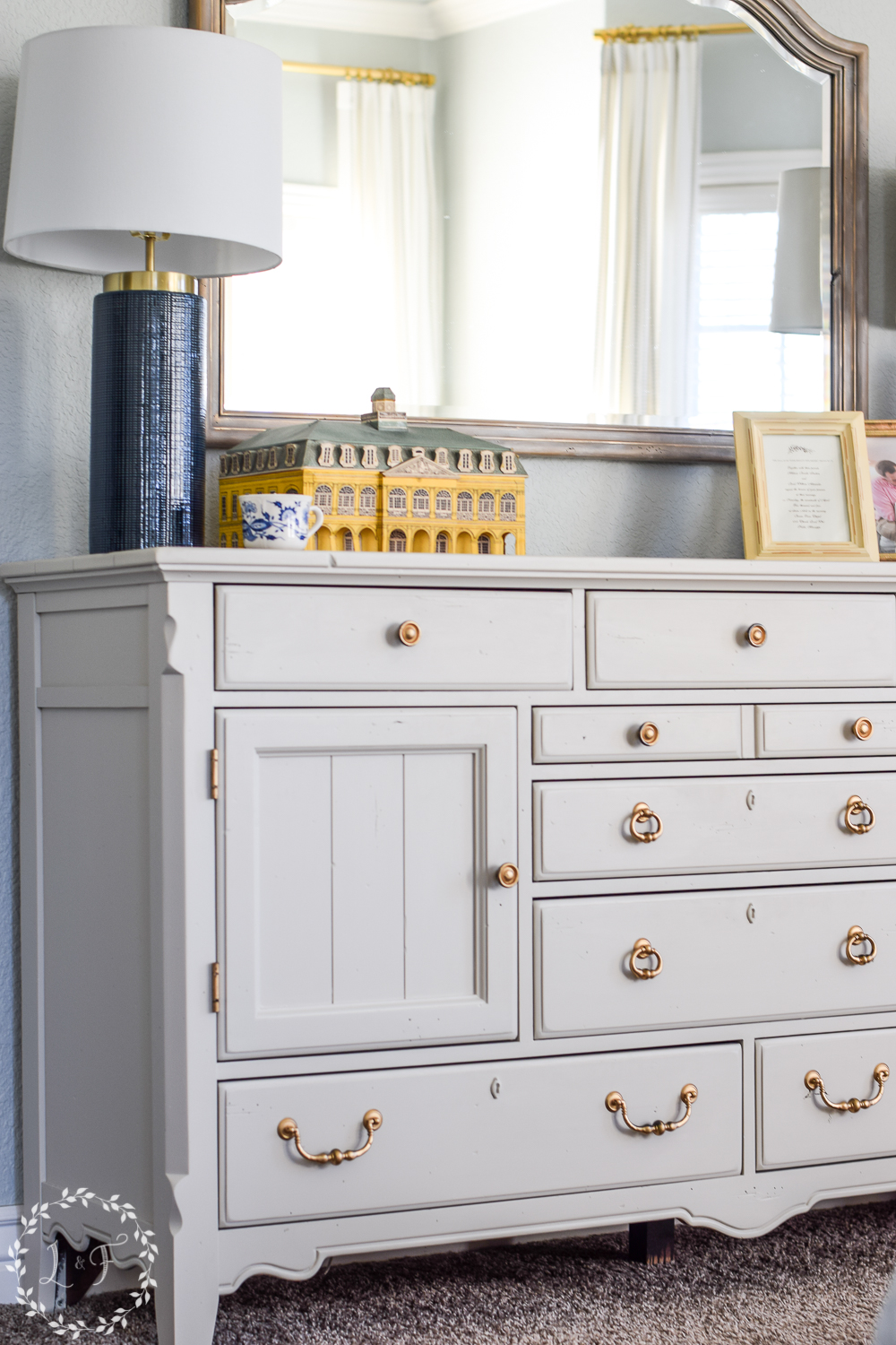 white dresser in a bedroom