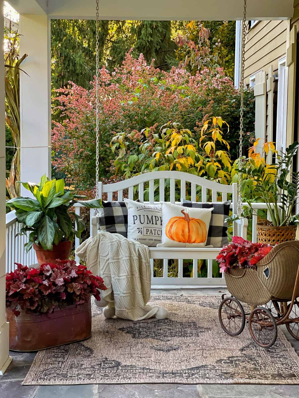 front porch decorated for fall