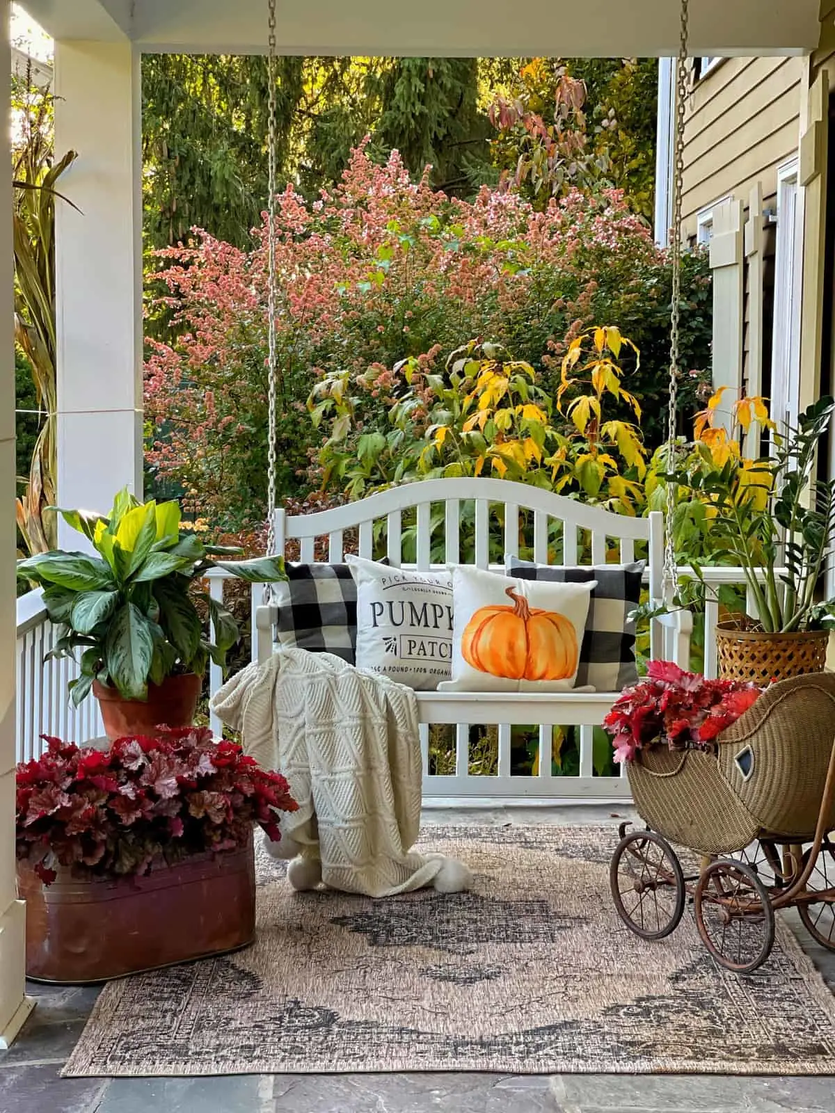 front porch decorated for fall