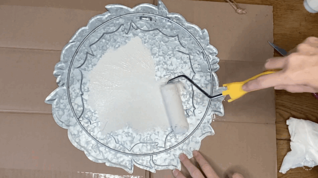 painting a thrift store sign